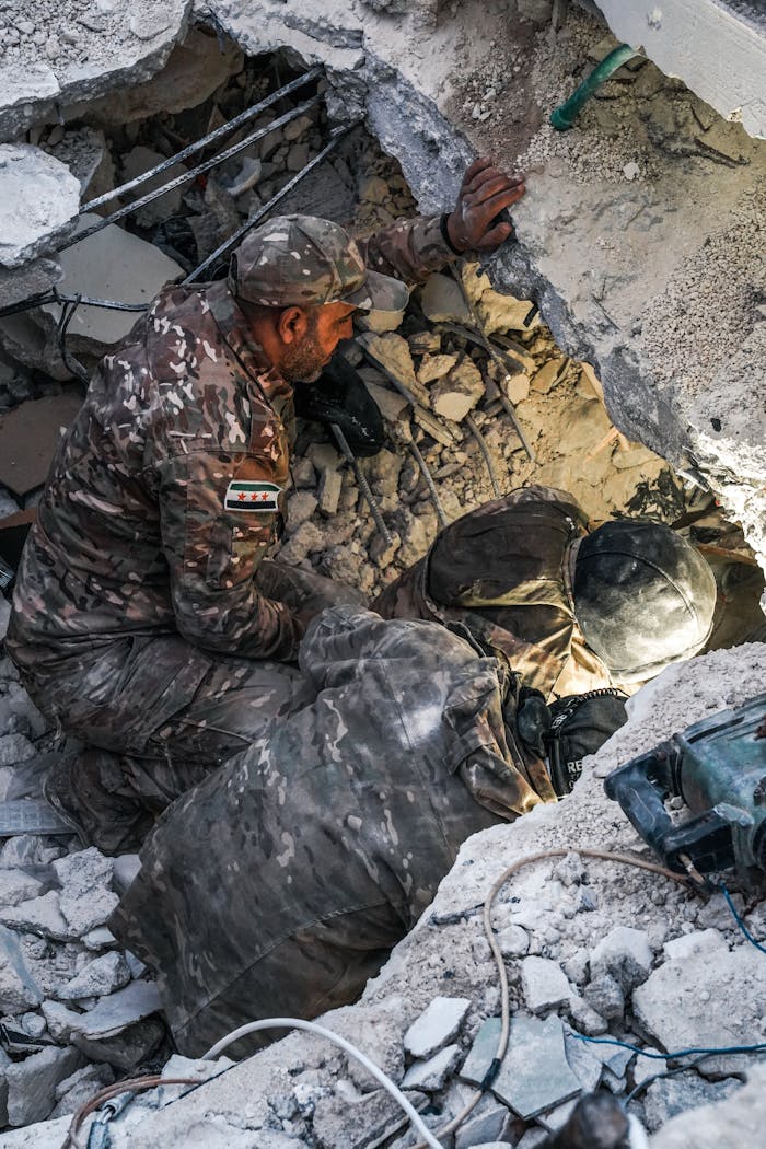 Rescue workers search for survivors amidst rubble in Jindires, Aleppo after a devastating earthquake.